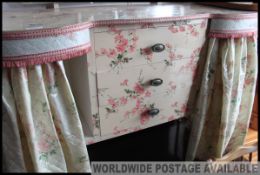 A chintzy retro vintage kidney shaped dressing table,