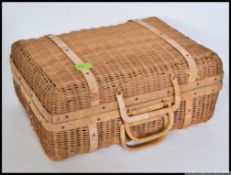 A vintage whisker case containing various items#ms relater to sewing,