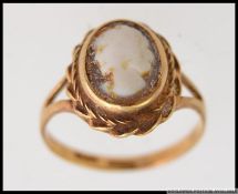 A vintage early 20th century 9ct gold ladies cameo ring.