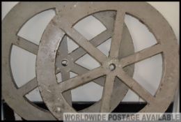 A pair of vintage mid century scratch built cart wheels,