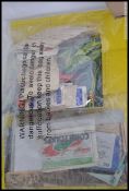 A collection of postcards 117 UK with stamps, 118 foreign with stamps and 350 plus unused,