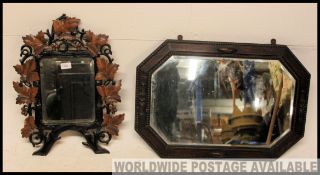 A collection of mirrors to include 1920's examples together with a leaf embellished wall mirror