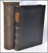 An early 20th century bible with leather cover being gilt tooled.