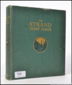 A vintage ' Strand ' stamp album, filled with various stamps - overseas and GB.