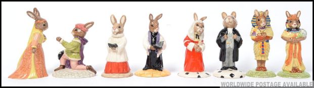 A group of 8 Royal Doulton Bunnykins to include Romeo , Juliet , Judge , Lawyer , Choir Singer ,