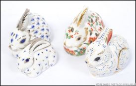 Four Crown Derby paperweights Bunny with gold button ,