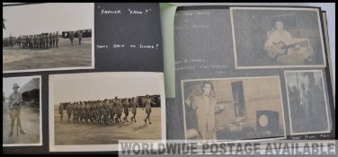 A photo album with highly decorative inlaid cover inscribed MALAYA with images of 1950s British