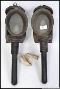 A pair of vintage cast and pressed metal carriage lamps,
