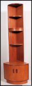 A retro 1970's G-Plan teak wood corner cabinet.