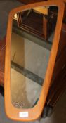 A vintage ' Atomic ' shaped teak wood 1970's wall mirror in the manner of G-Plan
