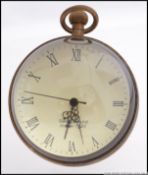 An antique style contemporary glass and brass ball clock.