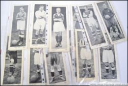 A box containing Football trade cards and cigarette cards to include Wills and topical times