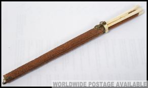 A 20th century wooden carved cased Chinese bone chop-stick set,