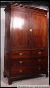 A good 18th century Georgian mahogany linen press tallboy.