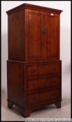 A 20th century mahogany antique style tallboy chest of drawers.