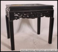 A 19th century Anglo - Chinese colonial ceramic and ebonised wood tray top table.