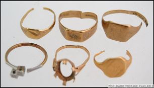 A collection of scrap rings to include gentlemans signet rings,