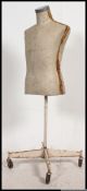 A vintage mid 20th century dress makers dummy,
