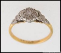 A vintage 18ct gold and platinum ladies diamond ring.