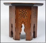 A good early 20th century mother of pearl inlaid arabic - anglo Indian opium table.