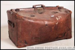A very large vintage late 19th early 20th century leather Gladstone / travel bag,