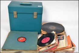 A collection of 45rpm vinyl records along with some 78rpm records all contained in a retro vinyl