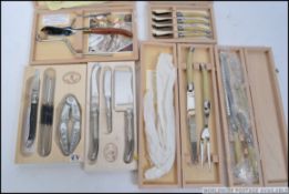 A collection of cased cutlery mainly by Laguiole, made in Laguiole,