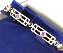 A Charles Rennie Mackintosh inspired 925 stamped silver bracelet,