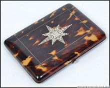 A stunning silver inlaid tortoiseshell aide de memoir case with beautiful appointed interior with