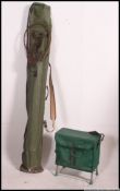 A collection of vintage fishing rods and equipment, to include cane,