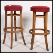 A pair of matching vintage bentwood Thonet style bar stools,