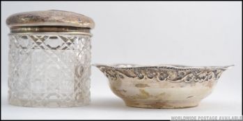 A silver ( tested ) 20th century peanut dish with rococo crimped borders, total weight 36.