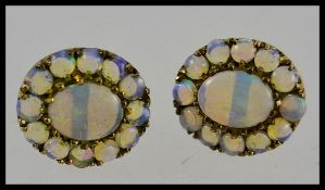 A pair of 9ct gold and opal ladies earrings. Total weight 2.