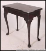 An 18th century George II mahogany folding card table.