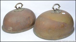 2 Victorian Copper meat covers, one being very large both with loop handles over the dome covers.