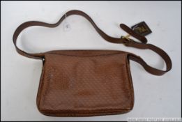 A stunning 20th century Ladies tooled leather Fendi handbag.