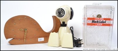 A mixed lot to include a retro whale shaped wall clock with brass hands,