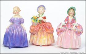 Three small Royal Doulton figures to include Marie HN 1370, Bo Peep HN 1811 and Cissie HN 1809.