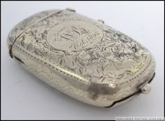 An unusual Victorian silver plated match vesta, sovereign holder and stamp holder case.