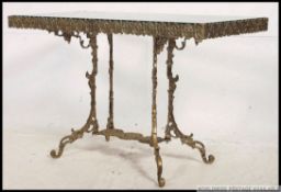 A 20th century vintage gilt cast metal coffee table base,