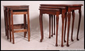 A 1940's oak nest of tables having graduating tops together with a reproduction mahogany nest of