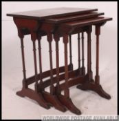 A Regency revival 20th century mahogany inlaid nest of tables.