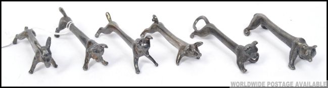 A stunning set of 6 silverplated Chinese knife rests each with differing animals.