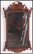 A 19th century walnut pier mirror. The c