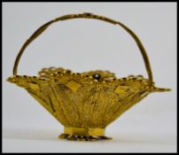 A vintage 20th century filigree worked y