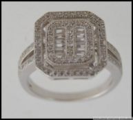 A silver 925 white metal and cz dress ri