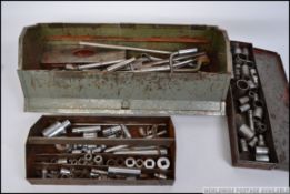 A vintage metal metamorphic tool box com