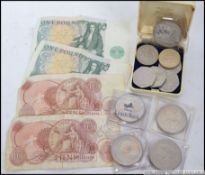 A collection of disused coins and bank n