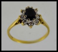 An 18ct gold sapphire and diamond ladies