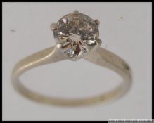 A 14ct w/g brilliant cut diamond solitai